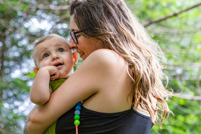 Mother and daughter outdoors