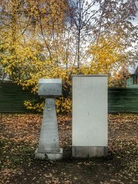 Fuse box against tree in autumn