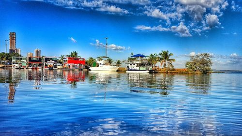 Boats moored at harbor