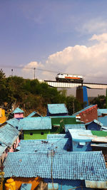 Scenic view of swimming pool against buildings