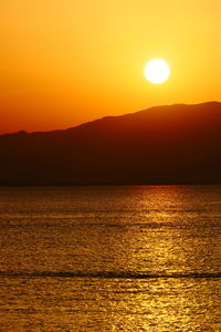 Scenic view of mountains at sunset