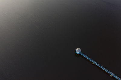 High angle view of electric lamp against black background