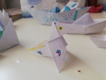 High angle view of multi colored paper on table