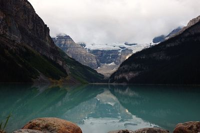 Panoramic view of lake and mountains against sky