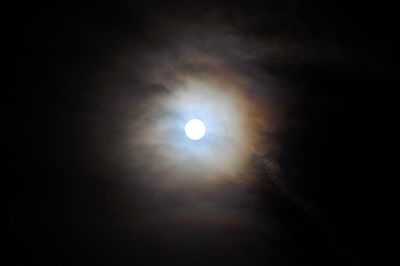 Low angle view of moon against sky at night