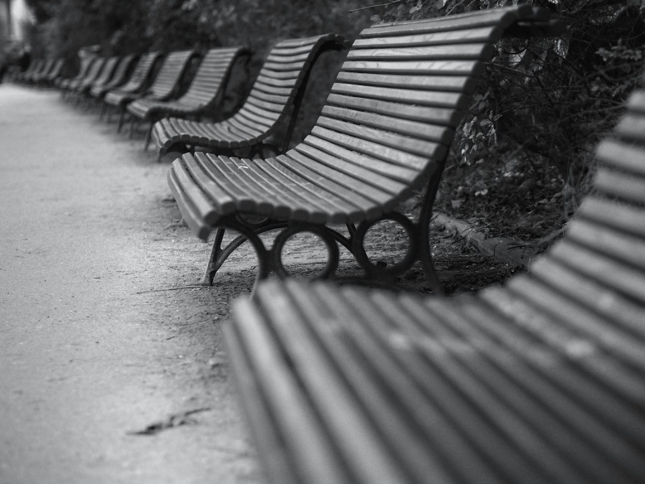 empty, absence, bench, shadow, wood - material, the way forward, seat, chair, sunlight, railing, no people, wooden, steps, tranquility, day, pattern, boardwalk, outdoors, in a row, metal