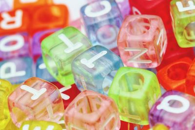 High angle view of multi colored toys on shelf