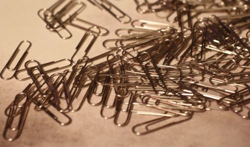 Close-up of clips on table