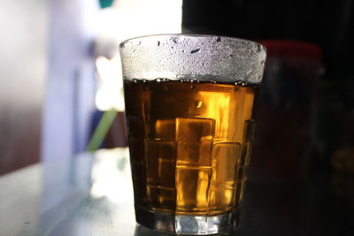 Close-up of beer glass