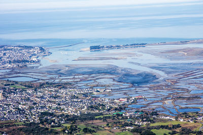 Aerial city against sea