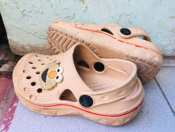 High angle view of shoes on floor