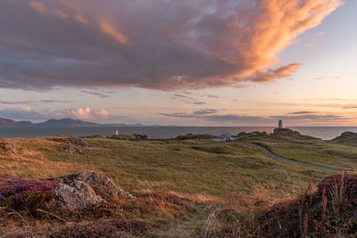 Scenic view of landscape against sky during sunset