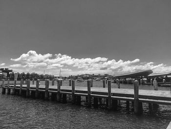 Pier over sea against sky