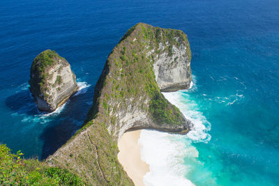 High angle view of rock formation in sea