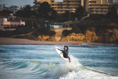 Man surfing in sea