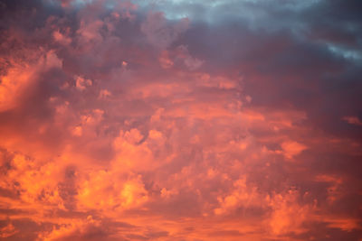 Low angle view of dramatic sky during sunset