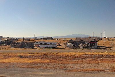 View of houses against clear sky