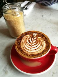 Close-up of coffee cup on table