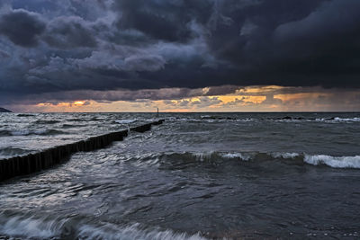 Scenic view of sea against sky during sunset