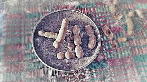 High angle view of coin on table