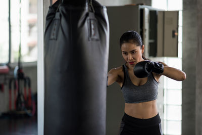 Woman exercising in gym