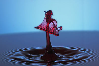 Close-up of water over white background