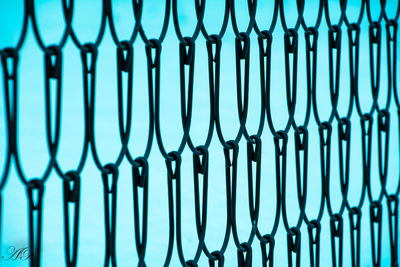 Full frame shot of glass metal fence