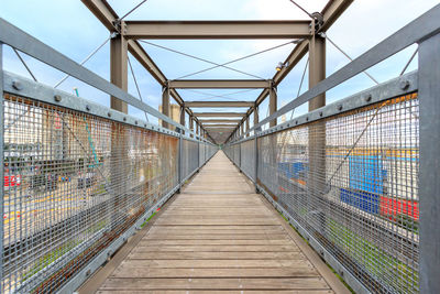 View of empty metal footbridge