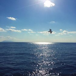 Scenic view of sea against cloudy sky