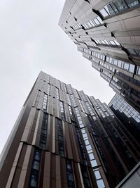 Low angle view of modern building against clear sky