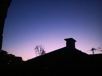 Low angle view of built structure against blue sky