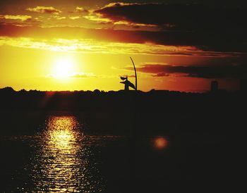 Scenic view of sunset over river