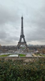 View of tower against cloudy sky