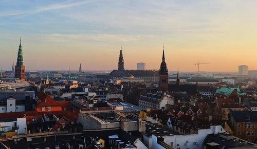 View of copenhagen cityscape against sky