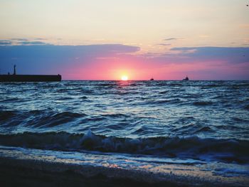 Scenic view of sea against sky during sunset