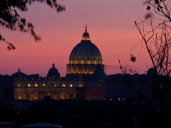 Cathedral against sky during sunset in city