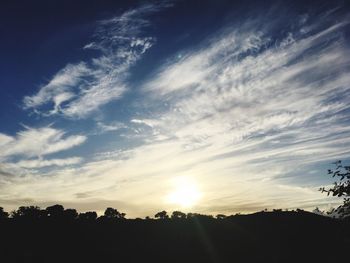 Scenic view of silhouette landscape against sky during sunset