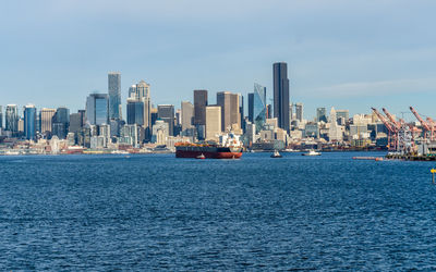 A variety of ships and machinery create congestion at the port of seattle in washingotn state.