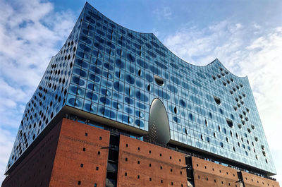 Low angle view of modern building against sky