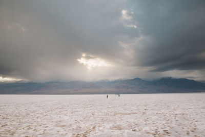 Scenic view of sea against sky during winter