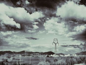 View of landscape against cloudy sky