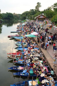 Boats moored at harbor