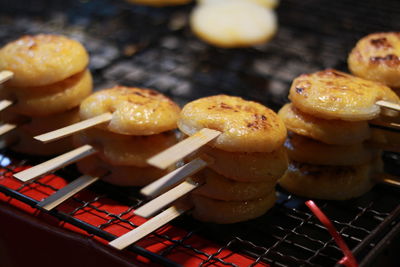 Close-up of meat on barbecue grill