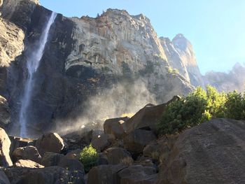 Panoramic view of rocky mountains against sky