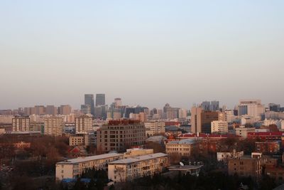 High angle view of buildings against clear sky