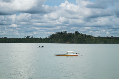 Boat sailing in sea