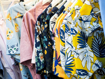 Clothes hanging in store for sale