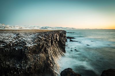 Scenic view of sea against clear sky