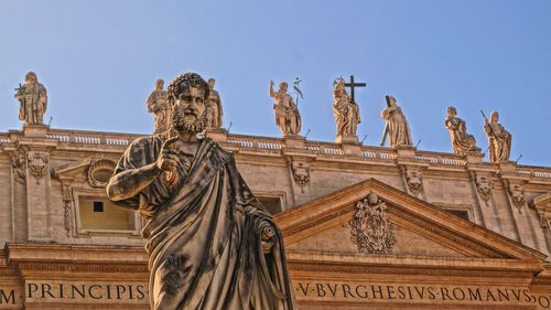 Low angle view of statue against sky