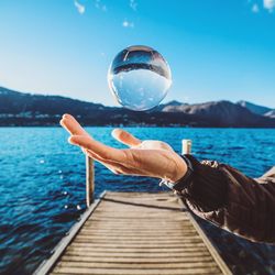 View of calm sea against blue sky